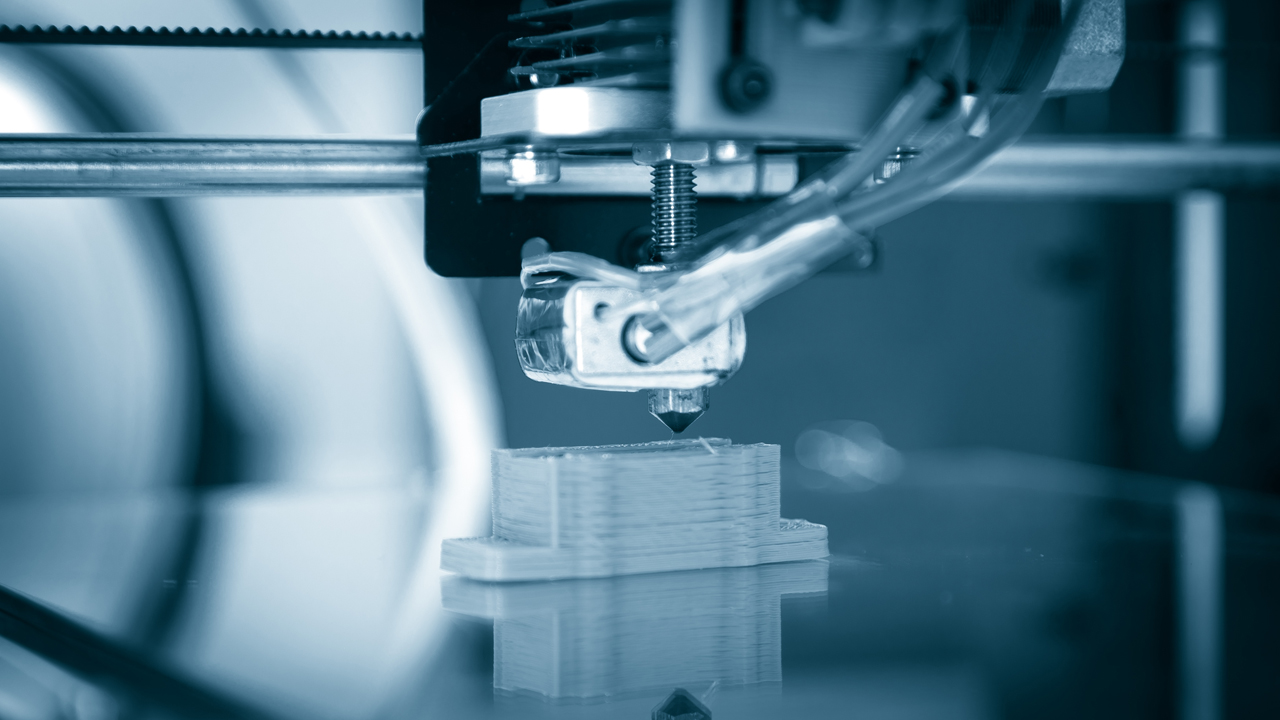 Close up of 3D printer printing an object