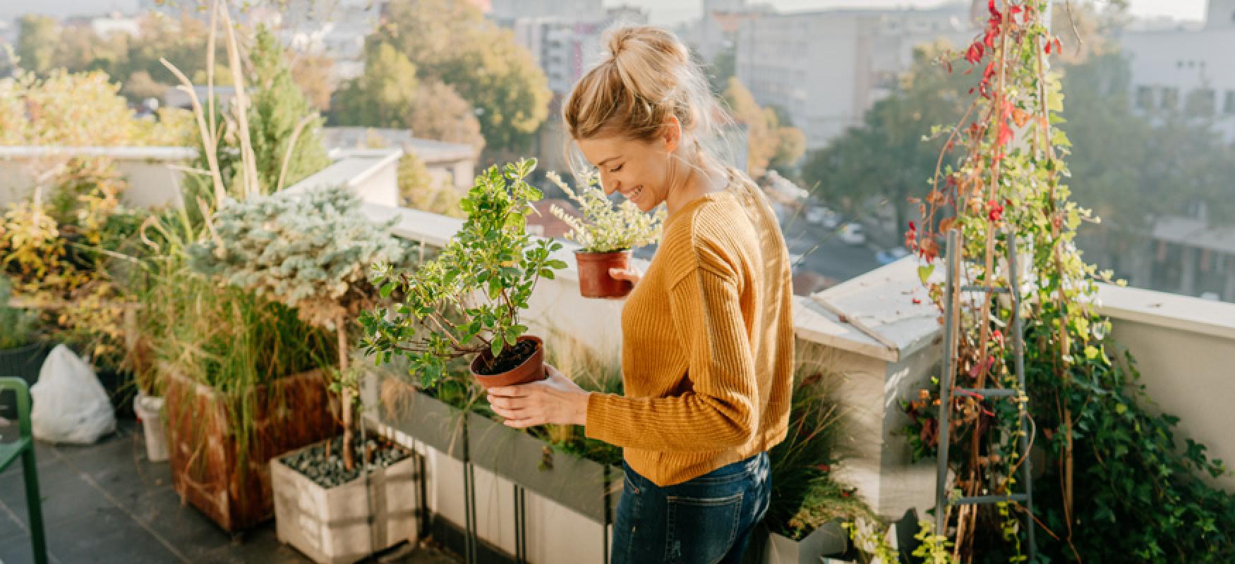 Woman in a rooftop urban garden