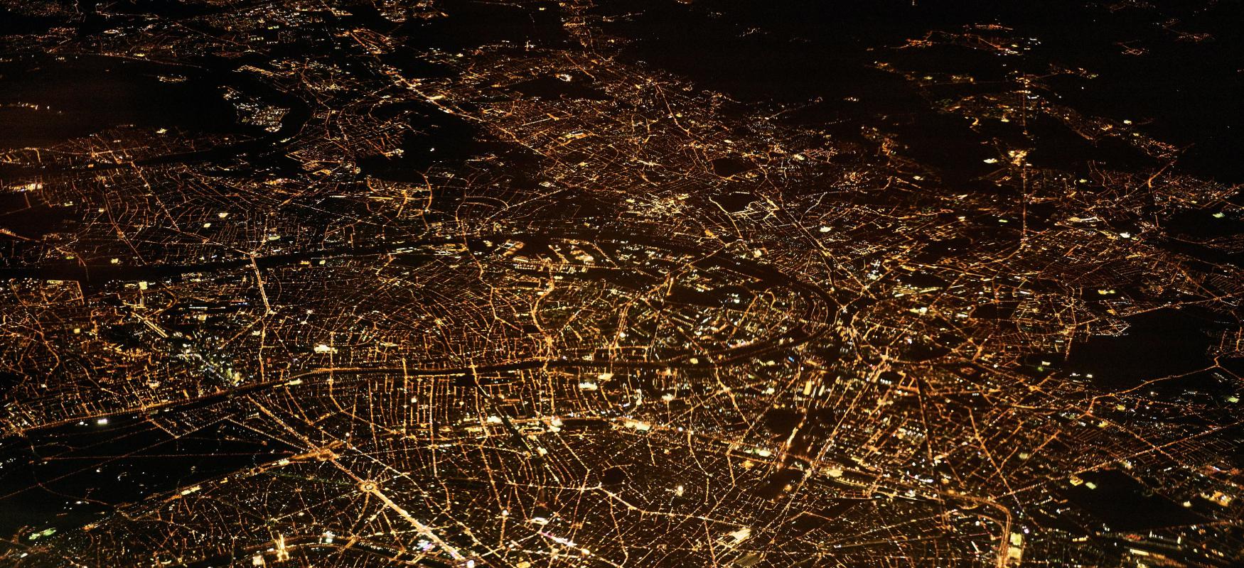 Paris at night seen from the air.
