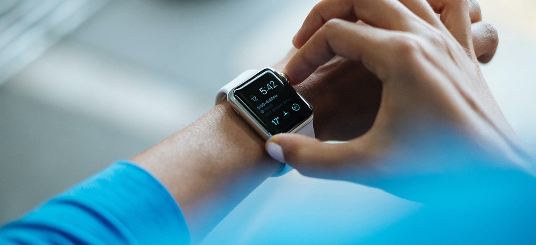 Person wearing smart watch.