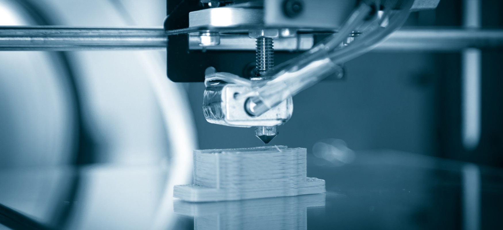 Close up of 3D printer printing an object