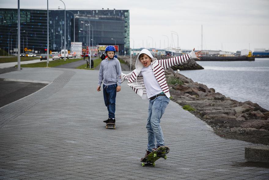 Two teenagers skating in Reykjavik.