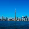Toronto skyline by day seen from the sea.