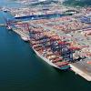 Areal shot of the port in Gothenburg with containers and a container ship.