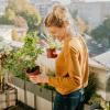 Woman in a rooftop urban garden